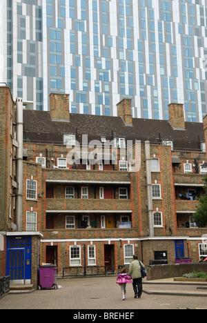 Nido student accommodation towering over traditional east London housing estate. Brune estate London E1. HOMER SYKES Stock Photo