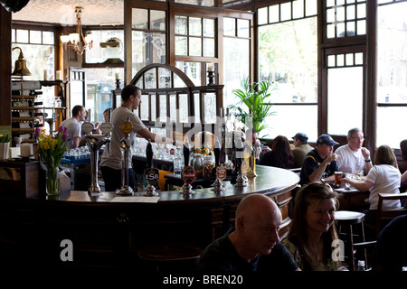 The Crown a popular pub for beer and food in Islington London Stock Photo