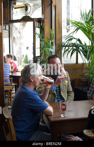 The Crown  a popular pub for beer and food in Islington London Drinking Fullers real ale Stock Photo