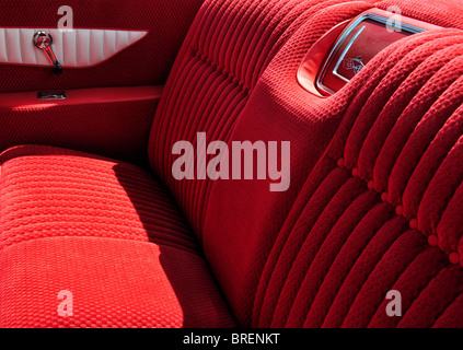 Tuck and roll upholstery of rear seat of a classic 1961 Chevrolet Impala Convertible Stock Photo