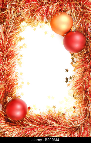 Christmas template with white space surrounded by Christmas decorations, tinsel and confetti Stock Photo
