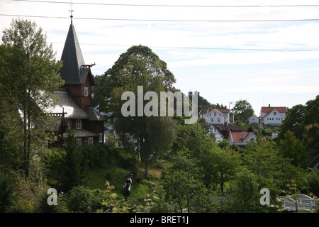 The old stave church, built in 1903, was a gift from Bolette Olsen. Hvitsten Stock Photo