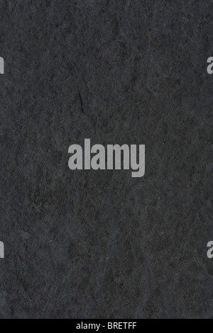 Rough textured background in dark gray stone Stock Photo