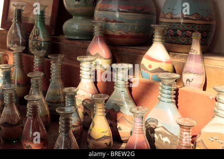 Bottles of sand art for sale near The Roman Ruins of Jerash, Jordan, Middle East. Stock Photo