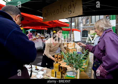 Greek olive trader at Borough Market, south London Stock Photo