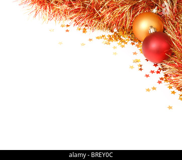 White space with a Christmas design in the top right corner featuring red and gold baubles, tinsel and confetti Stock Photo