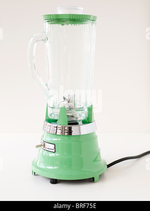 Green blender on white background, close-up Stock Photo
