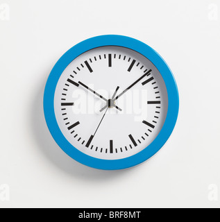 Clock on white background, close-up Stock Photo