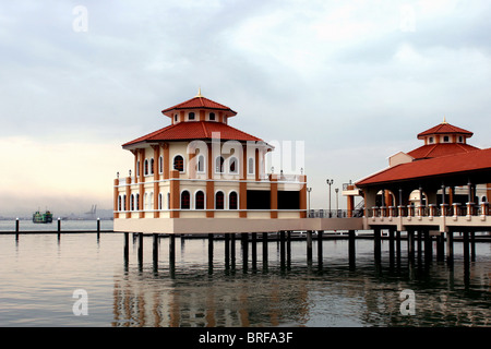 A beautifully designed ferry terminal is one of the modern additions to the waterfront in Penang, Malaysia. Stock Photo