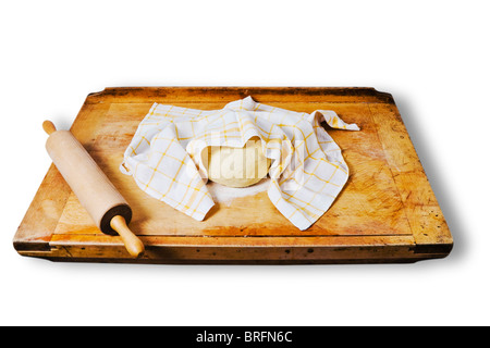 leavened dough on a  breadboard Stock Photo