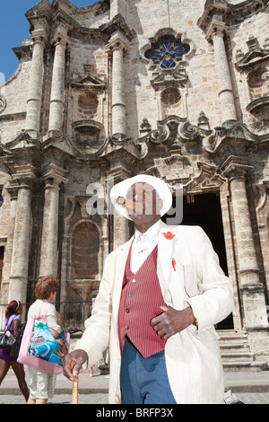 HABANA VIEJA: PLAZA DEL CATHEDRAL AND MAN WITH CIGAR Stock Photo