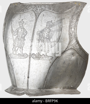 An etched German back plate for a suit of armour,circa 1580,some of the etching done later. Back plate made in one piece with shaped shoulder blades,and turned under and corded rims. Embossed decorative lines with a cruciform mark in the region of the lower back. Fine original black etching of elaborate martial trophies along the edges. Additional etchings showing two Landsknechts added during the Historismus period. Height 37 cm. Provenance: Paul Collection,Berlin. historic,historical,16th century,defensive arms,weapons,arms,weapon,arm,fighting dev,Additional-Rights-Clearences-Not Available Stock Photo