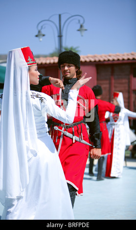 Turkish Men And Women Wearing Traditional Clothes Performing Anatolian Dances Of Artvin Kars