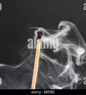 smoking match after being extinguished Stock Photo
