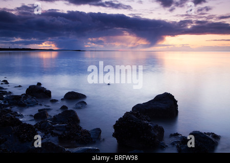 Low Tide Sunset, New Brighton Beach, Wirral Peninsula Stock Photo