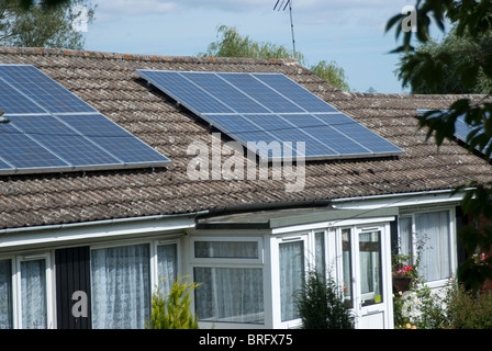 Solar Electricity Panels on domestic house roof Stock Photo