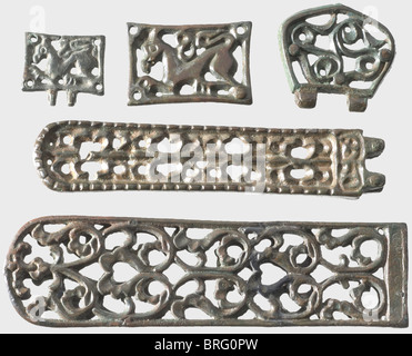 A set of Avar relics,Southeast Europe,5th/6th century A.C. Bronze with greenish-brown patina. 22 different pieces,displaying elaborate openwork. Belt tips,buckles,bridle pieces,and mountings,including two pieces depicting horses. The large belt tip is slightly restored. Cleaned excavation discovery. Dimensions 2 to 12 cm. historic,historical,ancient world,Migration Period,Middle Ages,object,objects,stills,clipping,clippings,cut out,cut-out,cut-outs,metal fittings,iron mounting,iron mountings,accessory,accessories,jewellery,jewelry,Additional-Rights-Clearences-Not Available Stock Photo