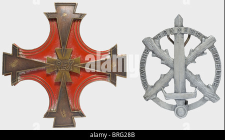 Awards and insignia,of a Walloon Legionnaire Walloon Honour Rexist Badge(also called the 'Blood Order')in Silver(migrated),hollow-stamped,reverse iron wire attachment pin and award number '430'. Cross of Merit(pin missing),red lacquer with bronzed attachments. Order of 10 May 1940(pin missing). Arm shield 'Wallonien' in BeVo issue for the 373 Infantry Battalion and enamelled civil badge. Rexist Arm Badge in NSKK(reverse glue traces),dark blue with red edges and Cross of Burgundy. Identity disc 'Wall. Wachabt. II. Batl.',historic,historical,1930s,,Additional-Rights-Clearences-Not Available Stock Photo