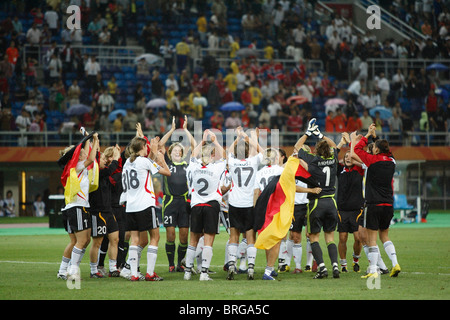 German players celebrate after their semifinal victory over Norway at the 2007 Women's World Cup. Stock Photo