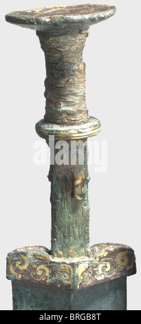 A Chinese bronze sword with a gold-inlaid grip,Warring States period ,5th/4th century B.C. Double-edged,heavily ridged white bronze blade with some heavy green encrustations,as found,and bluish cracks in places. Bronze quillons,disk hilt,and disk pommel have lavish,completely preserved gold inlays. Heavy,greenish patina,the gold threads encrusted in places. Grip has remnants of the wooden grip scales and fabric wrapping. Length 56 cm. Remarkably well-preserved bronze sword of extremely high quality manufacture. A similar example may be found in the ca,Additional-Rights-Clearences-Not Available Stock Photo