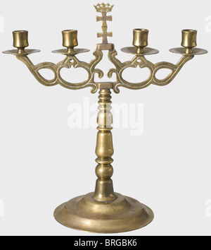 A Danzig candelabra '19. September 1939',Danzig ist befreit(Danzig is liberated)Extended,four candle,brass candelabra with the crowned Danzig double cross,swastikas,and the date '19. September 1939'. The stepped,round base bears the engraved inscription 'Danzig ist befreit'(Danzig is liberated)between two swastikas. Height 41.5 cm. Width 38 cm. On 19 September 1939,the Danzig Gauleiter Albert Forster greeted Adolf Hitler in the Artushof in Danzig. The historic words 'Danzig ist befreit' occurred in both his and Hitler's speeches.,historic,historica,Additional-Rights-Clearences-Not Available Stock Photo