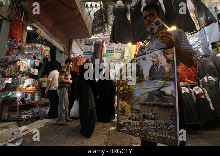 A Vendor selling DVD movies in Qaysari bazaar in the city of Erbil also spelt Arbil or Irbil the capital of the Kurdistan Region northern Iraq. Stock Photo