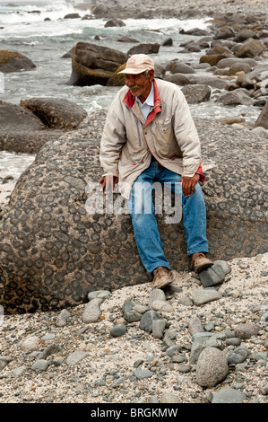 Mr Hipolito Avalos in front of Granito Orbicular Santuario de la Naturaleza Rodillo Atacama Pacific Coast Chile South America Stock Photo