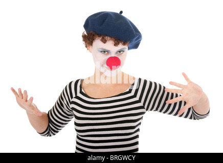 Young woman wearing clown face and performing mime gestures. Stock Photo