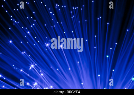 closeup on decorative blue optic fibers under black background Stock Photo