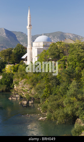 Koski Mehmed Pasa Mosque on the Neretva River in the Old Town of Mostar, Bosnia and Herzegovina Stock Photo