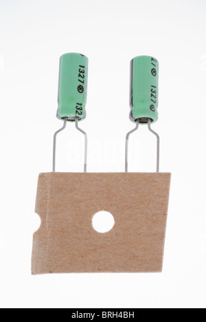 Electrolytic capacitors on bandolier Stock Photo