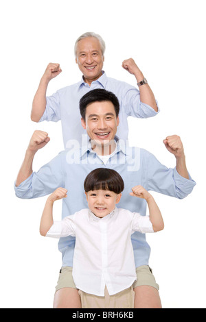 Three generations of strong males Stock Photo