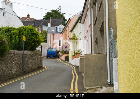 Narrow street with cottages in the coastal town of New Quay, Ceredigion, West Wales, UK Stock Photo