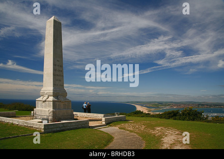 Looking west from the Isle of Portland war memorial along Chesil Beach and over Portland harbour Dorset, England UK Stock Photo