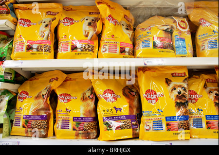 Songjiang, Shanghai, China. Chinese packaging brand dog pet food on shelf of Tesco supermarket Stock Photo