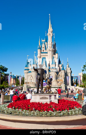 Walt and Mickey's Partners statue in front of Cinderella's Castle in Walt Disney's Magic Kingdom theme park Stock Photo