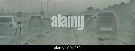 Freeway traffic during torrential rain storm in Houston, Texas, USA Stock Photo