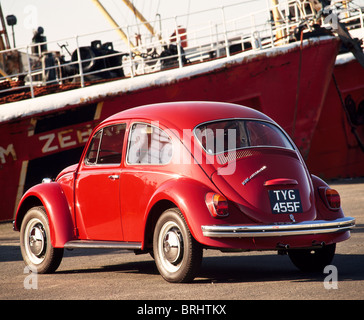 1967 Beetle 1500 Automatic parked next to a trawler near Hull Stock Photo