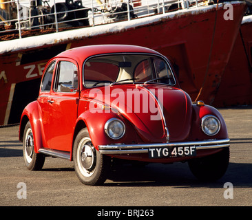 1967 Beetle 1500 Automatic parked next to a trawler near Hull Stock Photo