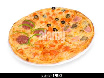 four quarters of different kinds of pizza on one dish, isolated on white, clipping path Stock Photo