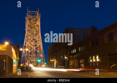 Aerial lift bridge in Duluth, Minnesota as seen from Canal Street at night. Stock Photo