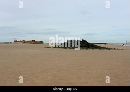 The beach and seafront at New Brighton on the River Mersey looking across to the city of Liverpool UK Stock Photo