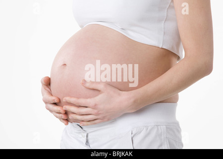 Close-up of Pregnant Woman's Belly Stock Photo