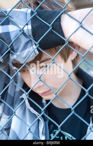 Close-Up of Sad Teenage Boy Stock Photo