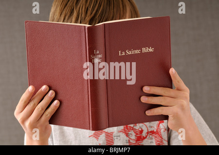 Boy Reading Bible Stock Photo