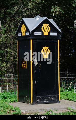 A listed Automobile Association telephone box at Brancaster Staithe, Norfolk with the traditional AA insignia Stock Photo