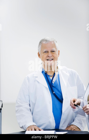 Doctor smiling, portrait Stock Photo