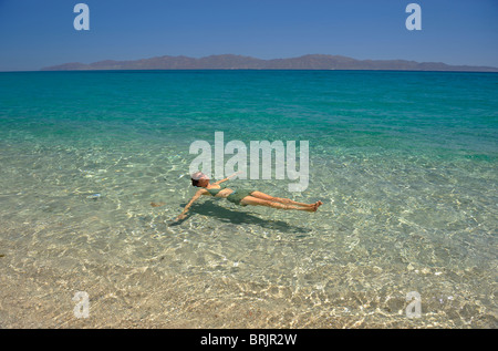 Person floating in water at Ventana Bay, Mexico.