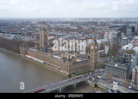A birds eye view over the Thames of the Palace of Westminster (Houses of Parliament) and Westminster from the London Eye in London, England, UK.
