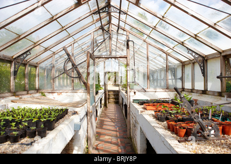 Old Green houses walled Victorian kitchen garden Stock Photo